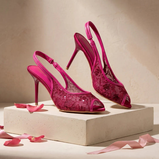 Peep-toe slingback sandals with floral patterned panels and a slender heel.