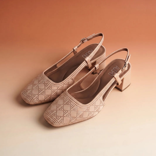 Square-toe slingback court shoes with geometric studs and a block heel.