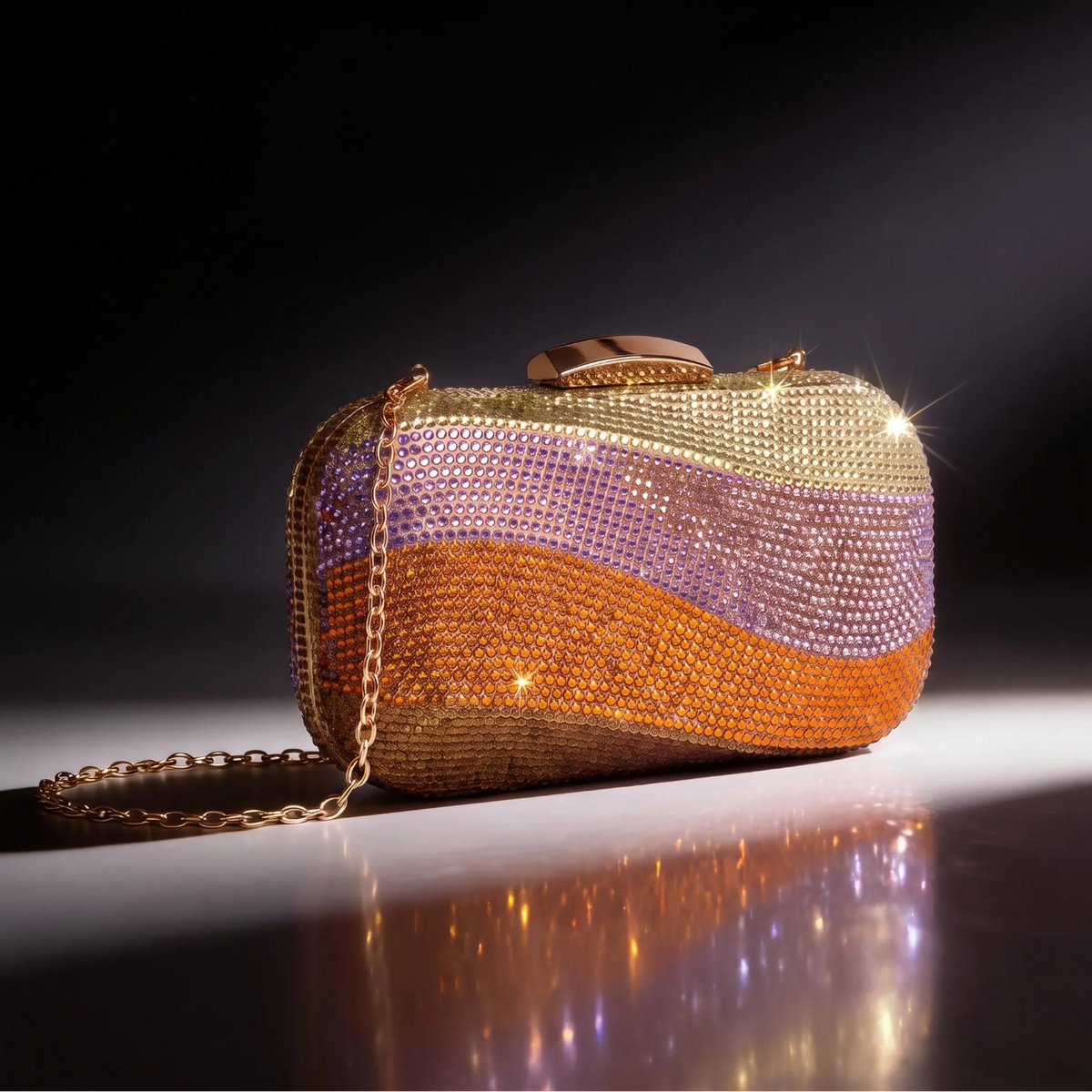Rectangular clutch with wavy embellished bands, rounded corners and a curved clasp.